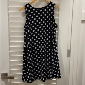 Flared sleeveless polka dot dress